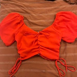 Red scrunched top